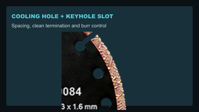 Cooling hole and stress relief slot